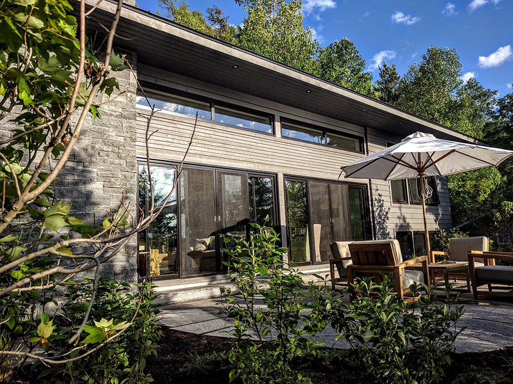 innovative-construction-custom-home1-landscaped-backyard